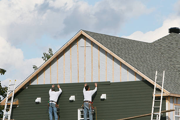 Professional Emergency Siding Repair technician working in Towson, MD